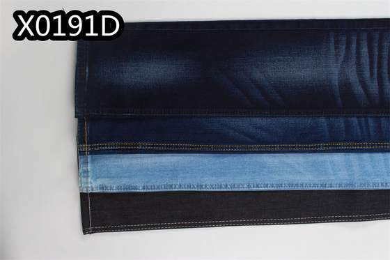 Kain Denim Sanforizing Gulungan Kain Dicelup Denim 10 Oz Spandex Dual Core 2%.