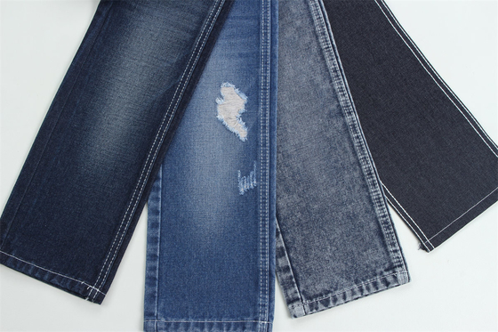 12.1 Oz Buat pagar 3x1 tangan kanan dengan tekstur permukaan yang kaya Katun Polyester Spandex Jeans Tekstil TR Kain Denim