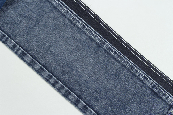 12.1 Oz Buat pagar 3x1 tangan kanan dengan tekstur permukaan yang kaya Katun Polyester Spandex Jeans Tekstil TR Kain Denim