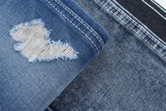 12.1 Oz Buat pagar 3x1 tangan kanan dengan tekstur permukaan yang kaya Katun Polyester Spandex Jeans Tekstil TR Kain Denim