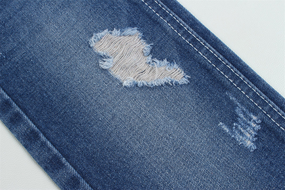 12.1 Oz Buat pagar 3x1 tangan kanan dengan tekstur permukaan yang kaya Katun Polyester Spandex Jeans Tekstil TR Kain Denim